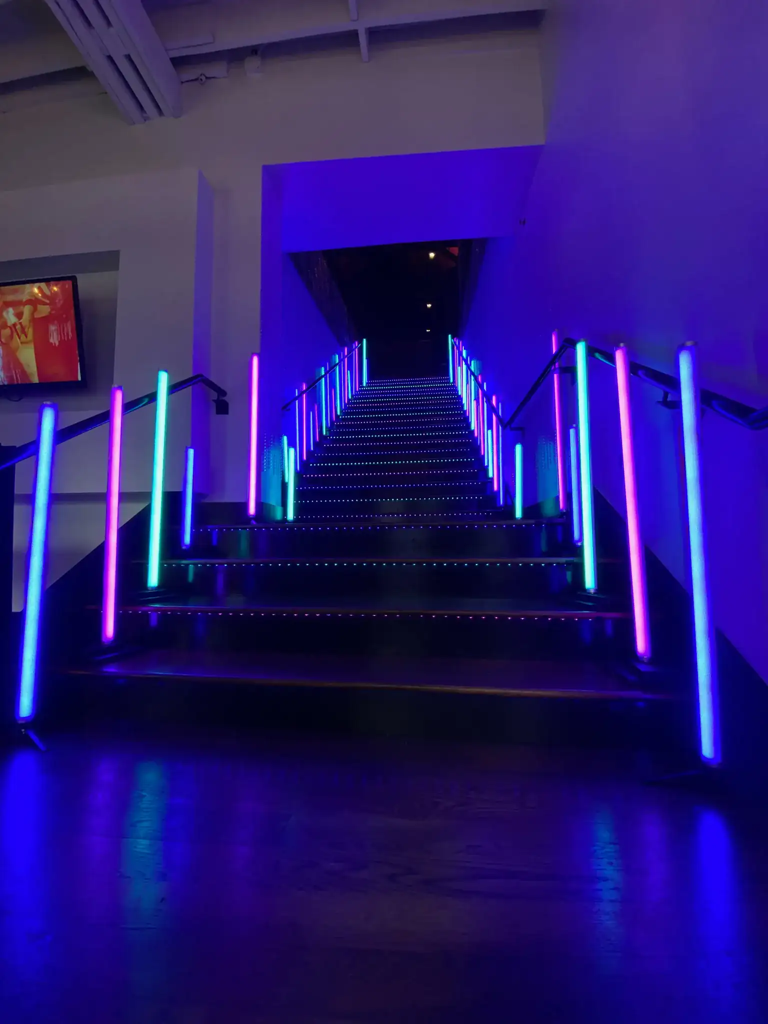 Multicolored neon and LED accent lighting installation